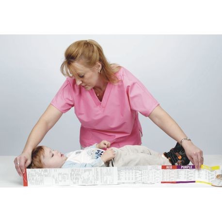 A medical professional using the Broselow Pediatric Emergency Tape with a child lying on a surface. The tape is color-coded with information and equipment for pediatric care.