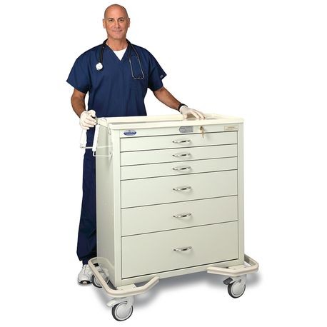 A beige medical cart with six drawers and an electronic touchpad lock being demonstrated by a male in medical attire.