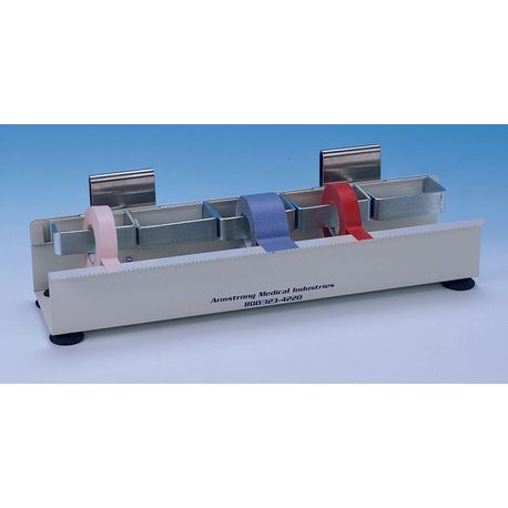 A silver tape dispenser with multiple compartments, each holding a different colored tape.