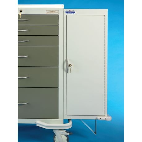 A gray medical cart extender with a key lock and multiple drawers, mounted on a white base, against a blue background.
