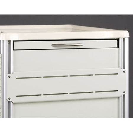 A white accessory panel with multiple slots, attached to the front of a medical cart.